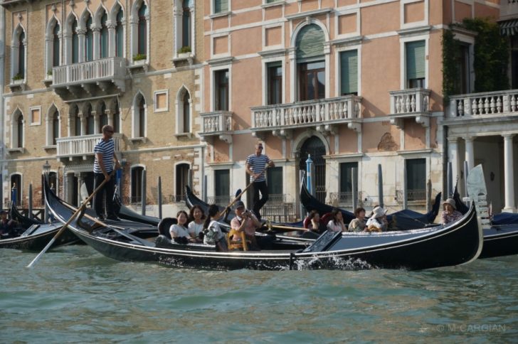 a group of people in a gondola