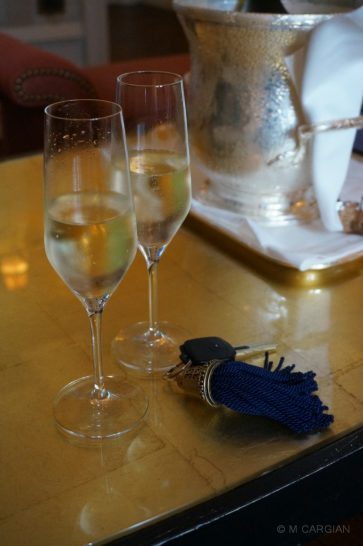 two glasses of champagne on a table