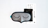 a sleeping mask and tickets