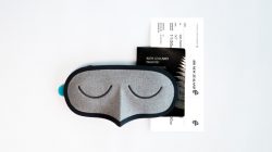 a sleeping mask and tickets