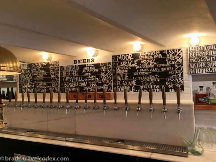 a row of taps in a bar