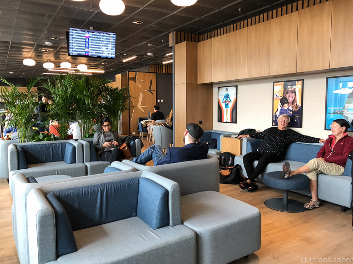 people sitting in a lounge area