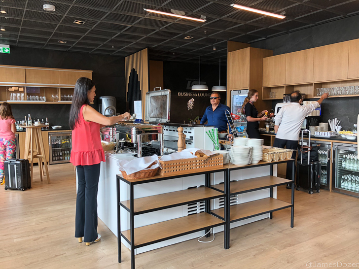 a group of people in a kitchen