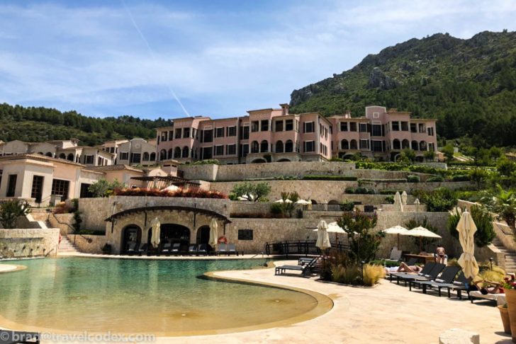 a pool with a building in the background