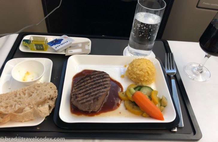 a plate of food on a tray