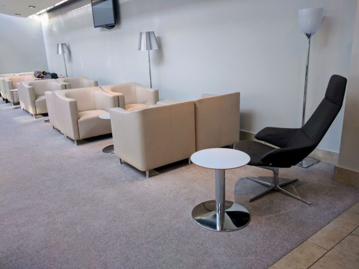 a room with chairs and a table