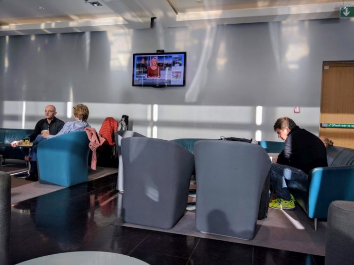 a group of people sitting in a room