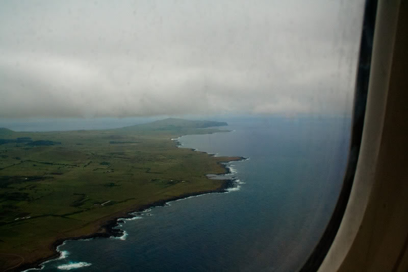 an aerial view of a land and water