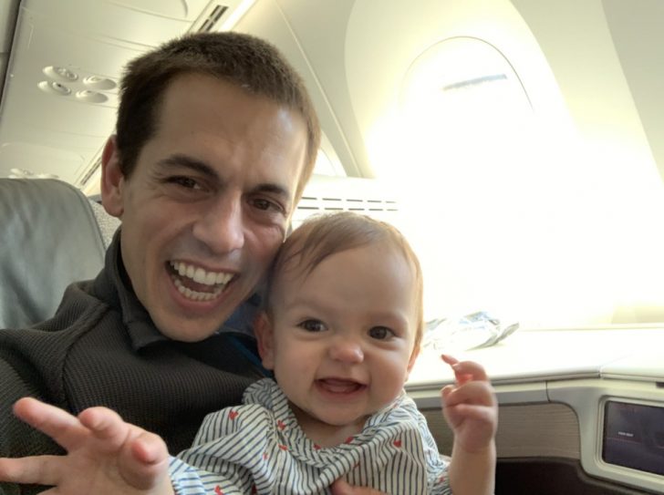 a man holding a baby