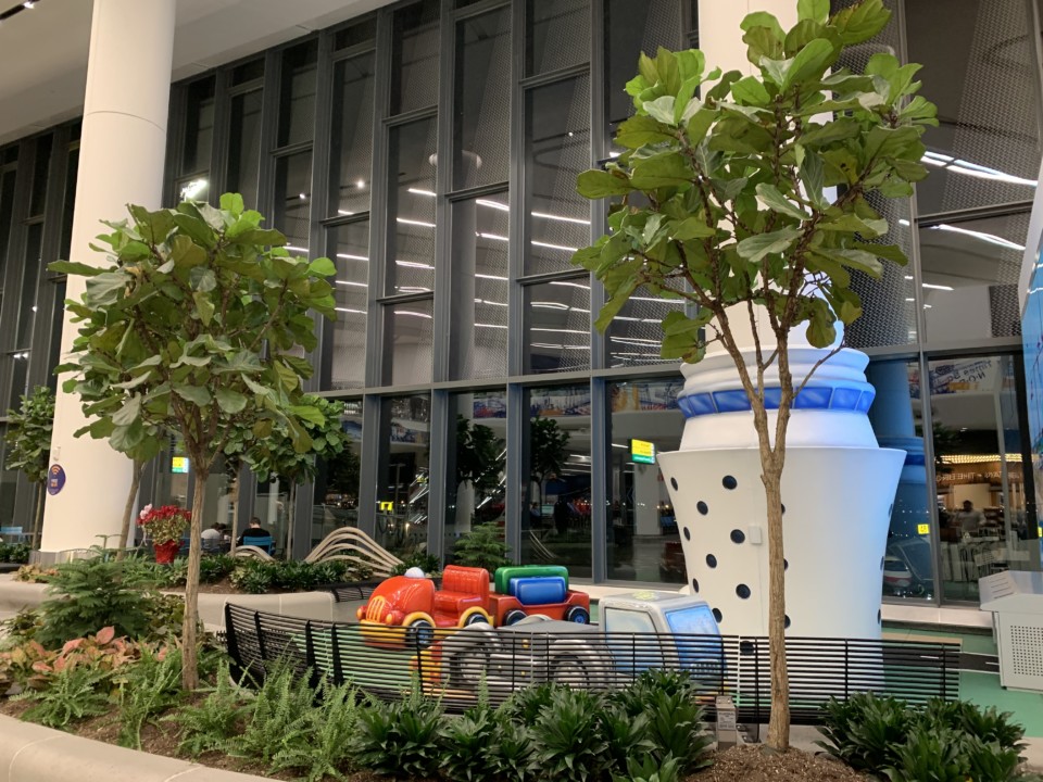 a small toy cars in front of a building