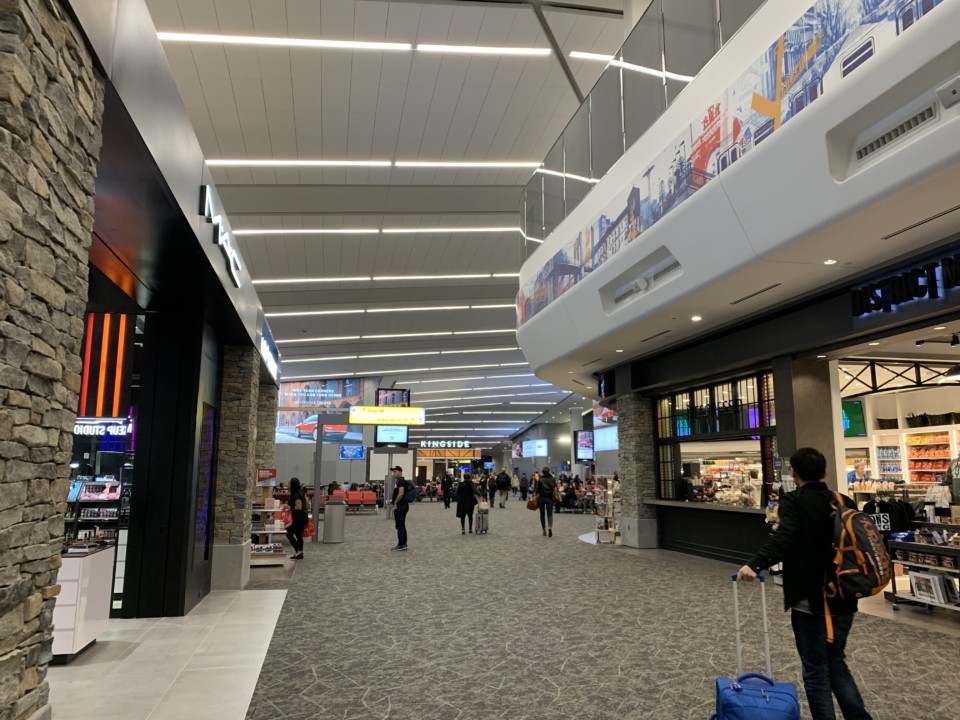 a group of people in a terminal
