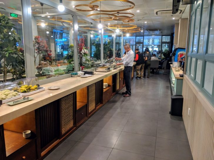 a man standing in a restaurant