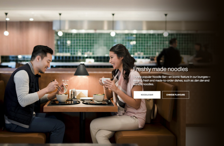 a man and woman sitting at a table