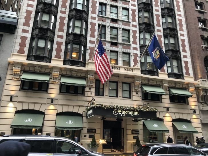 a building with flags on the front