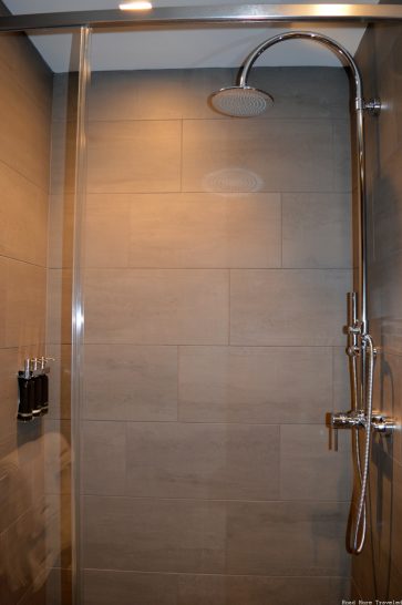 United Polaris Lounge Los Angeles - showerhead and dispensers