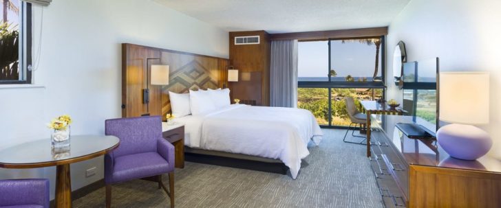 a room with a bed and a chair