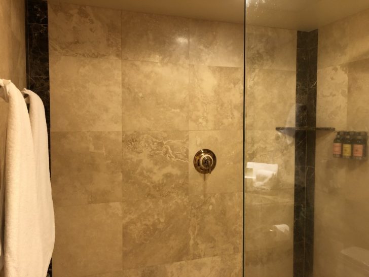 a shower with a glass door