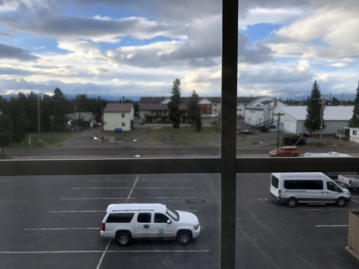 a view of a parking lot from a window