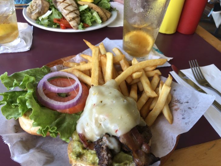 a plate of food with a drink and a plate of food