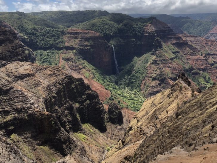 a mountain with a waterfall