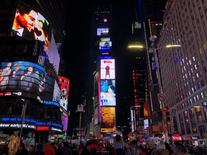 a group of people in Times Square