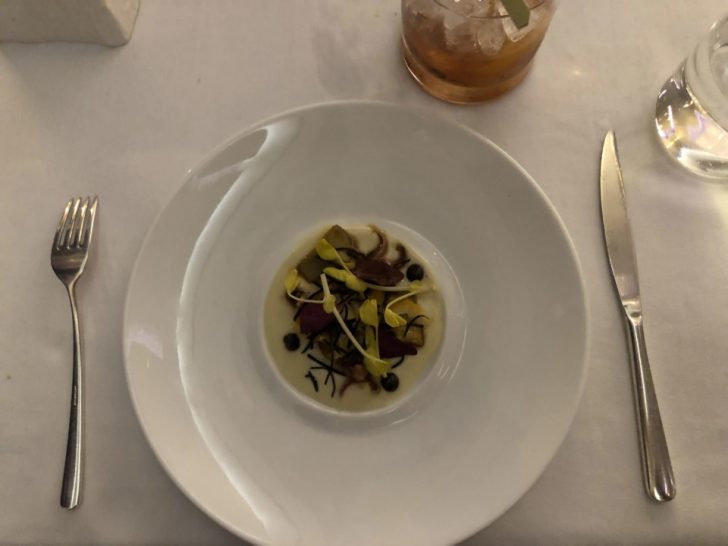 a plate with food in it