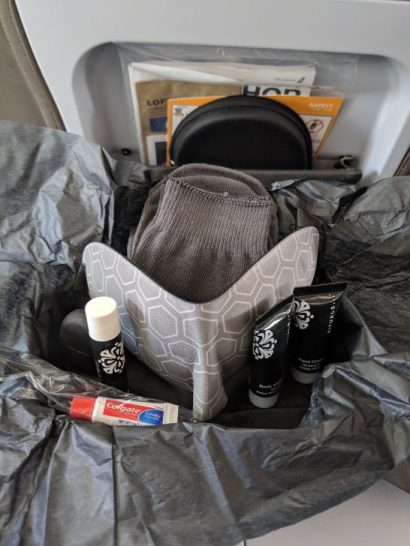 a hat and a mask in a bag