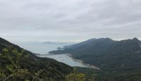 a view of a body of water from a mountain