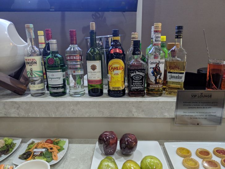 a group of bottles of alcohol on a counter