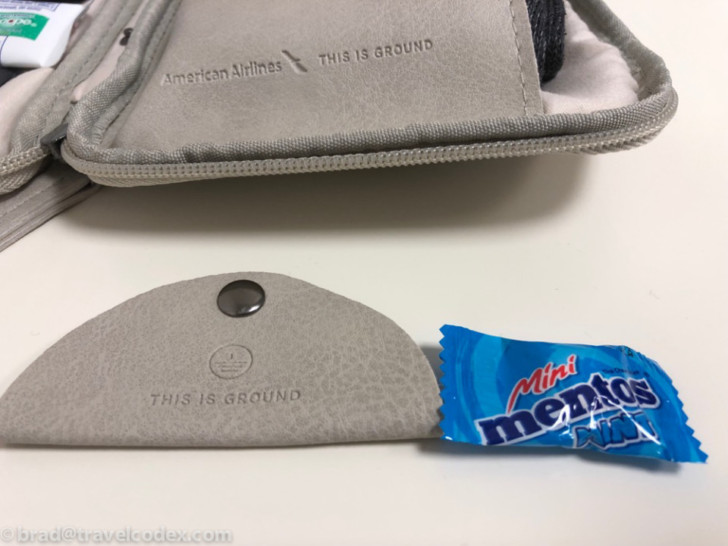 a small pouch with a small package of mentos air