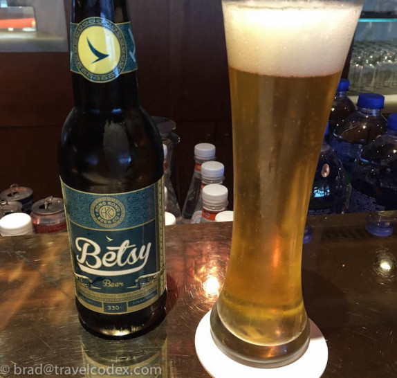 a bottle and a glass of beer