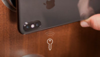 a cell phone on a doorknob