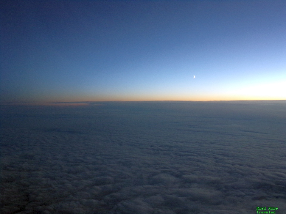 Moonlight and sunset over North Atlantic