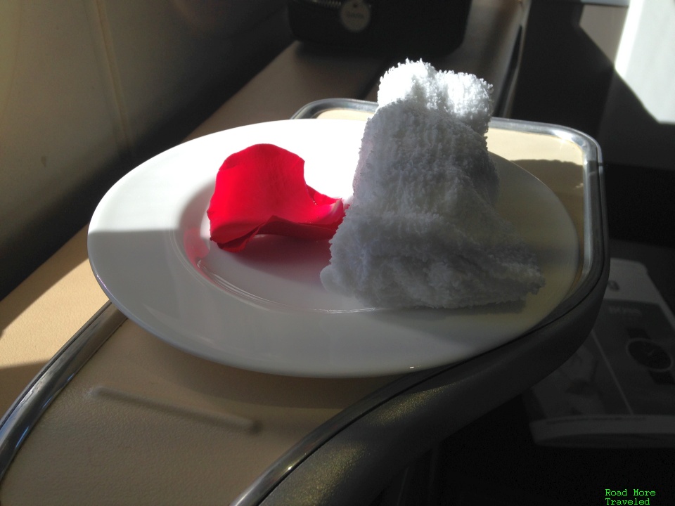 Pre-meal warm towel and rose petal