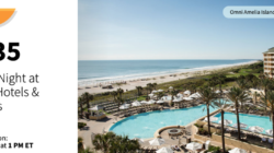 a swimming pool with umbrellas and chairs on a beach