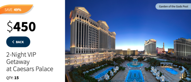a large building with a pool in front