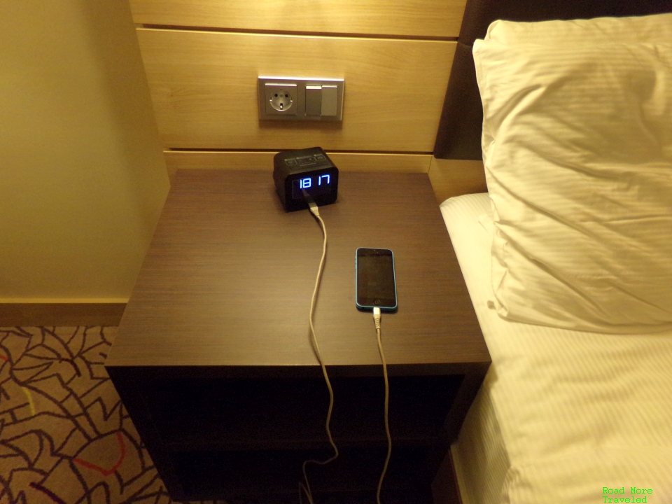 Nightstand, clock, and power outlet