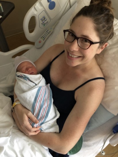 a woman holding a baby