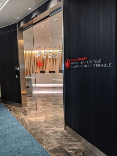 a glass door in a lobby