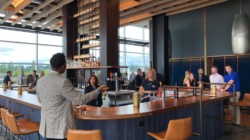 a man standing at a bar