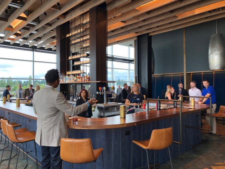 a man standing at a bar