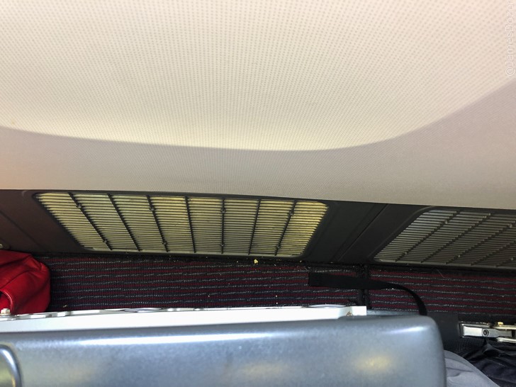 a ceiling with vent in the air
