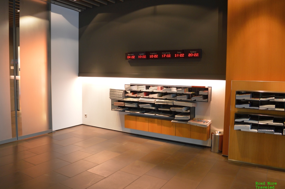 Lufthansa First Class Terminal - newspapers and world clocks