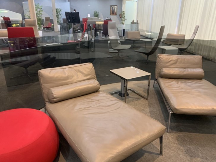 a room with chairs and tables
