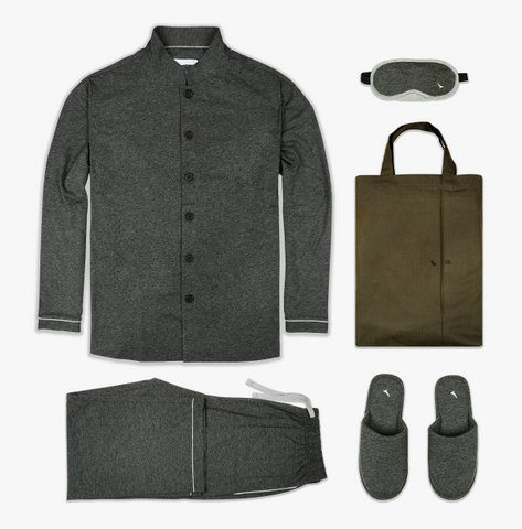 a grey shirt and slippers