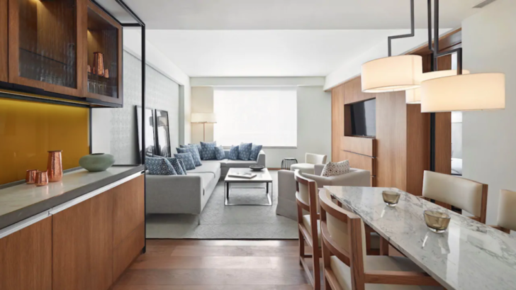 a living room with a couch and a table