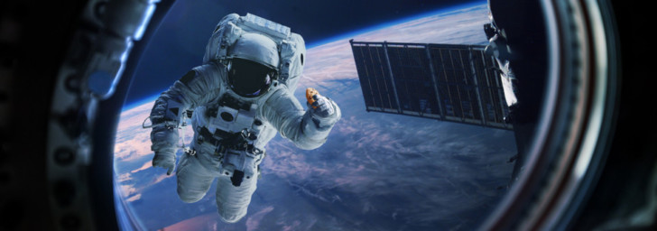 an astronaut in space with a satellite in the background