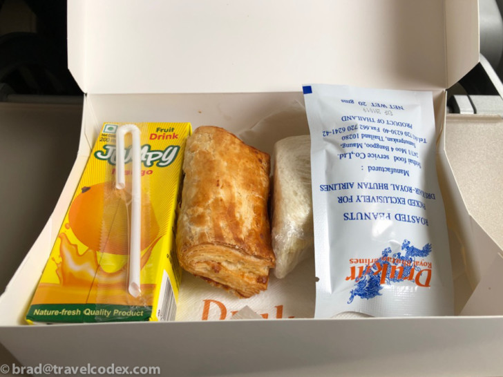 a box of food and a straw