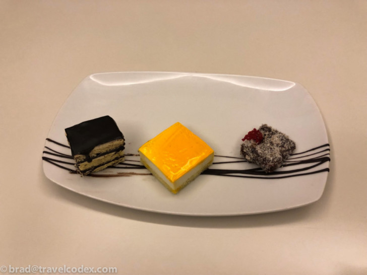 a plate of desserts on a table