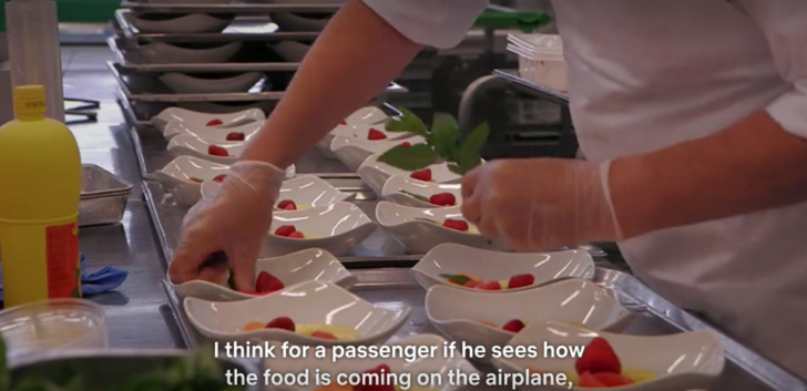 a person preparing food in a kitchen